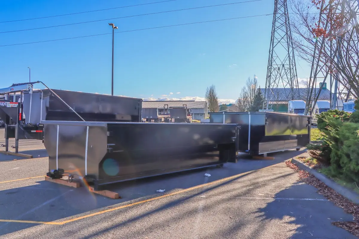 Roll-off dumpster ready for waste disposal at job site for Concrete Dumpster Rental in Pueblo